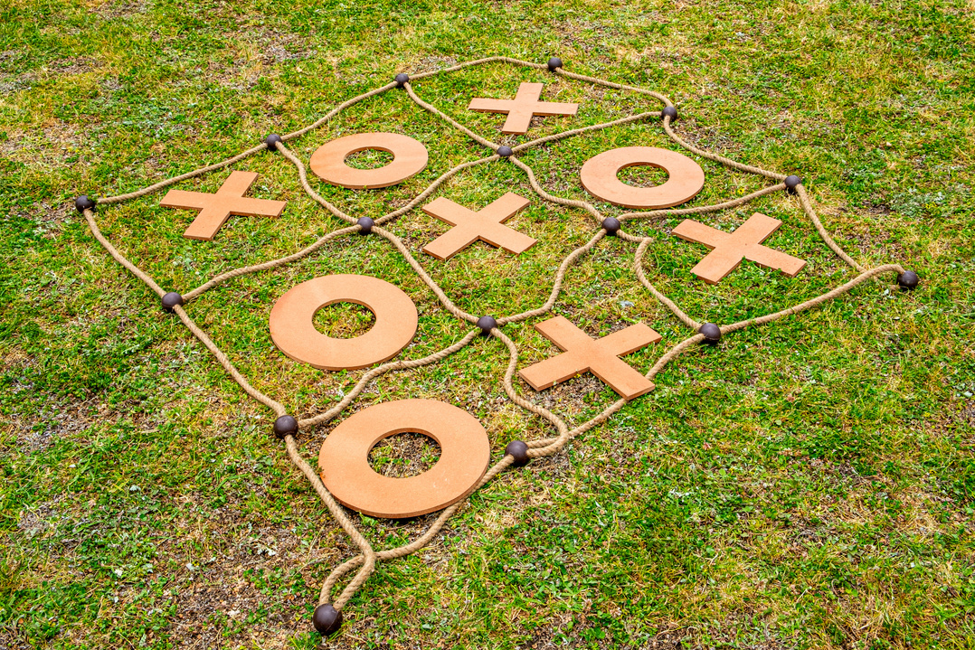Large tic tac toe yard game placed on the grass